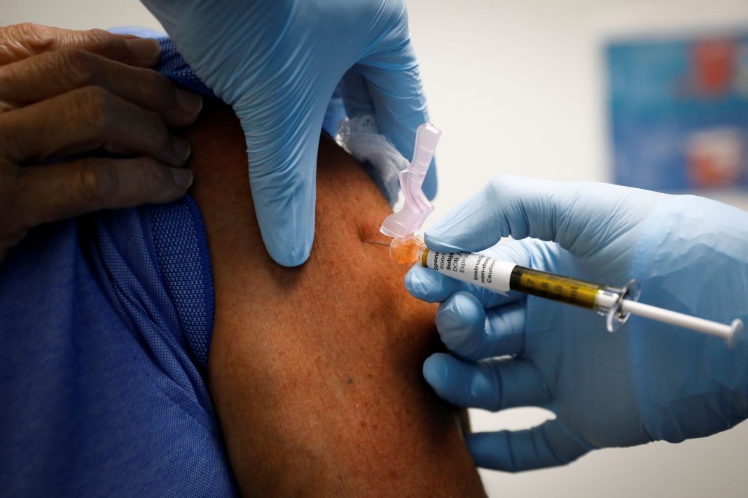 Side effects are signs shot is building protection, says ex-FDA chief