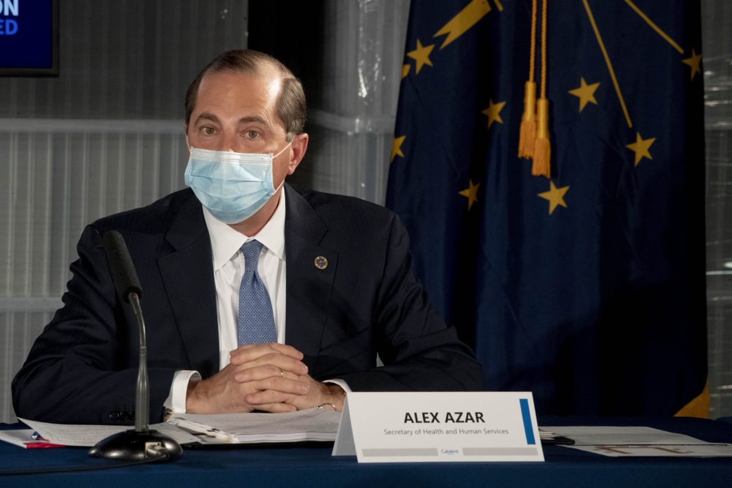 Trump health officials discuss Pfizer Covid vaccine as U.S. administers shots