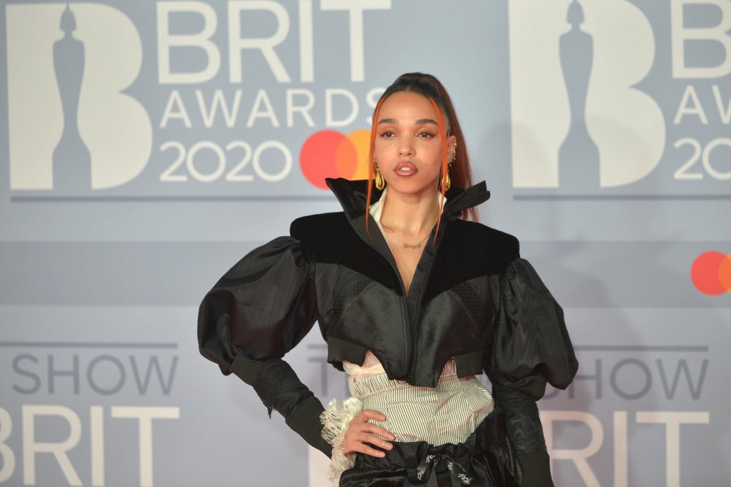 LONDON, ENGLAND - FEBRUARY 18: (EDITORIAL USE ONLY) FKA Twigs attends the 2020 BRIT Awards at the O2 Arena on February 18, 2020 in London, England.  (Photo by Jim Dyson / Redferns)