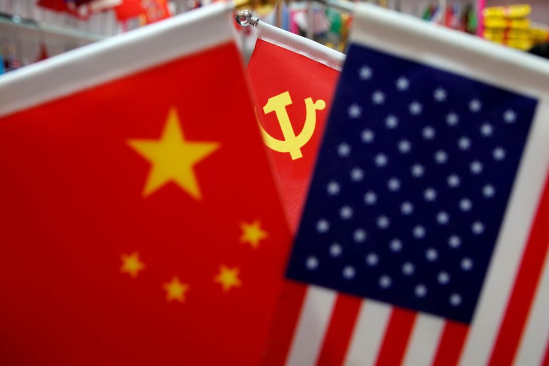 China says it will respond to delisting of telecom giants