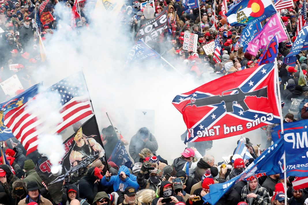 More than 50 police officers were hurt at pro-Trump riot that also killed 4