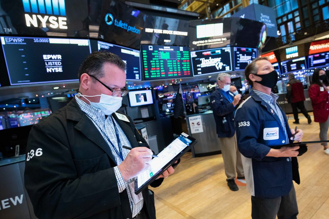 Stock futures fall after Wall Street closed at record highs to end last week
