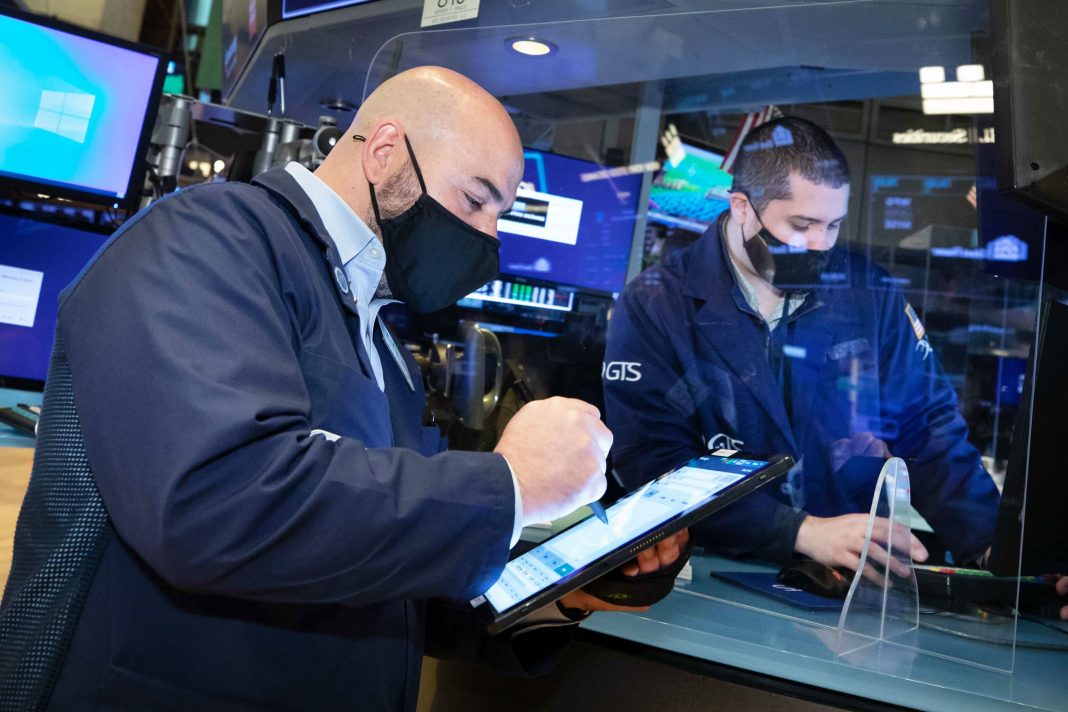 Dow rises 80 points as market tries to build on February's rally