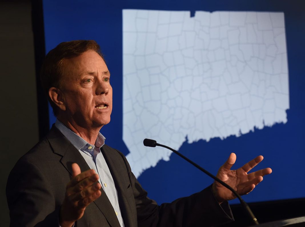 Gov. Ned Lamont defends easing Covid restrictions in Connecticut