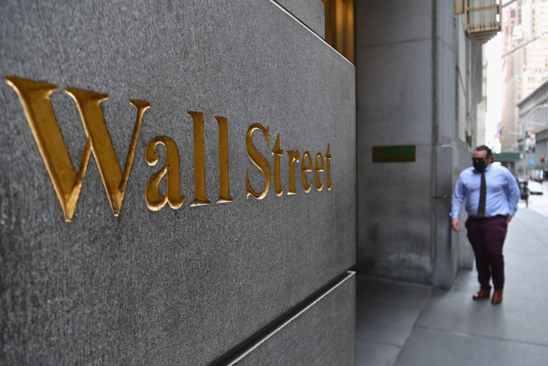 Stock futures are little changed as yields rise before an update from the Fed