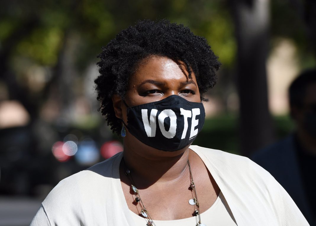 Georgia activists pressure big corporations to oppose voting restrictions
