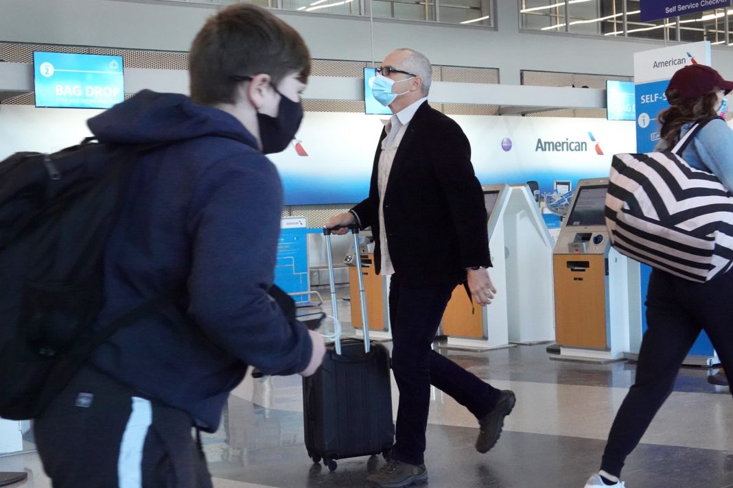 CDC chief warns of another Covid surge as Americans travel for spring break
