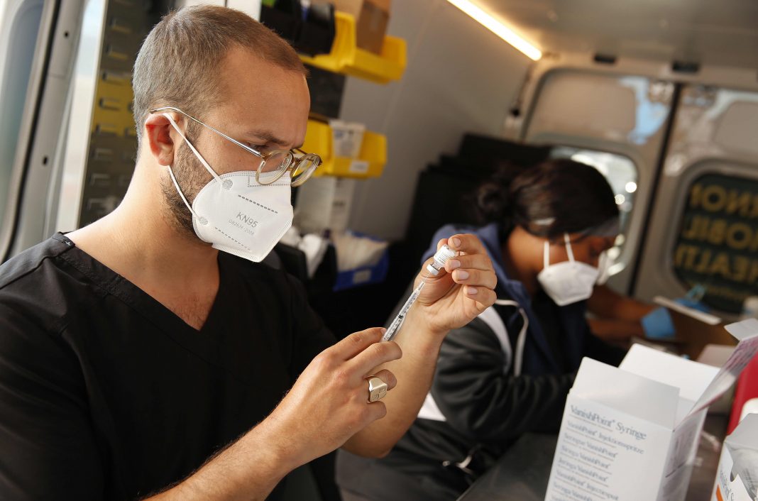 Covid cases are rising, hospitalizations have plateaued even as vaccinations rise