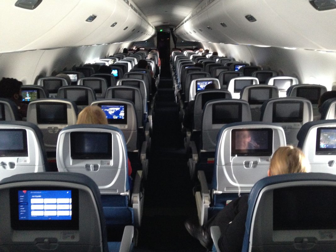 Open middle seats could reduce Covid exposure of maskless passengers