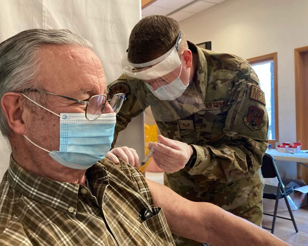 National Guard urges U.S. to follow health measures as military races to vaccinate population
