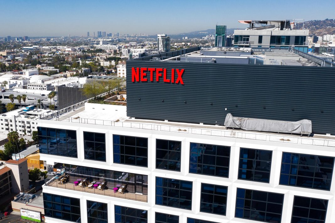 Netflix, CSX, Tenet Health & more