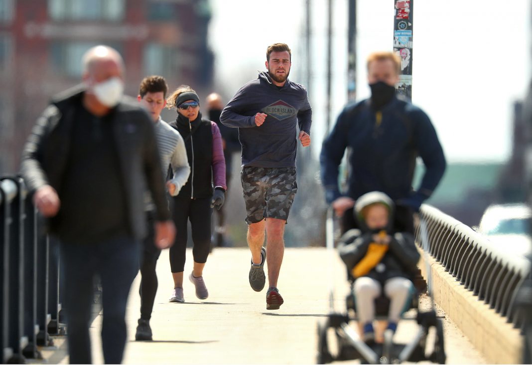 Fully vaccinated people can exercise, hold small gatherings outdoors without masks