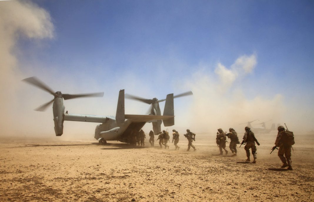 U.S. begins Afghanistan withdrawal, deploys military assets to protect troops